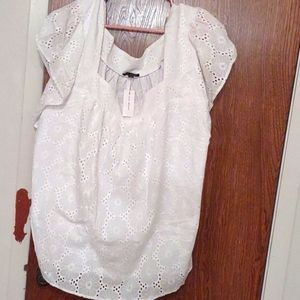 White flutter sleeve shirt.